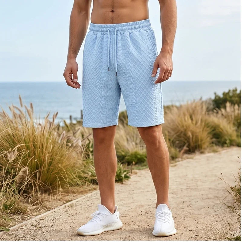 Model wearing Light Blue 2026 Summer Jacquard Texture Sports Shorts, Trendy Casual Five-point Pants For Men outdoors