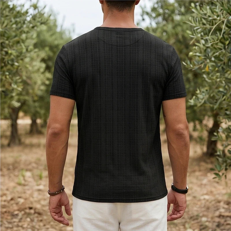 Model wearing Black Soren Cotton V-Neck Pocket Tee outdoors - 4