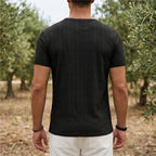 Model wearing Black Soren Cotton V-Neck Pocket Tee outdoors - 4