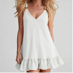 Model wearing White Women Deep V Sleeveless Tank Dress Ruffle Hem Loose Large Size Dress Holiday Beach Fashionable Comfortable Beach Baggy Sundress in studio