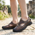 Model wearing Brown Cassian Genuine Leather Sport Sandals outdoors