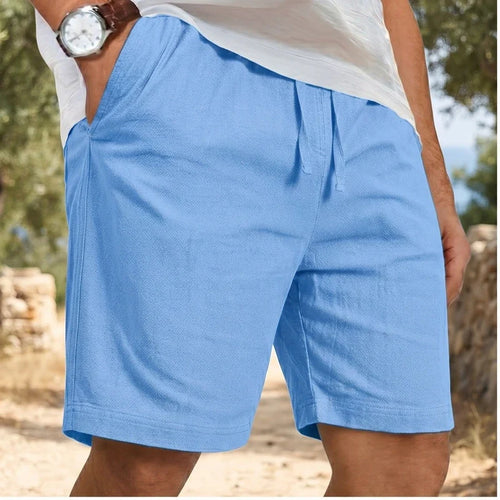 Model wearing Blue New Solid Linen Short Lightweight Gym Man Casual Pants Oversize Beach Hawaiian Baggy Pants Men Jogging Cotton Large Short Homme outdoors