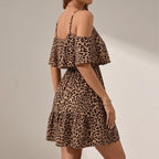Model wearing Brown Darcy Cold-Shoulder Leopard Dress in studio - 3