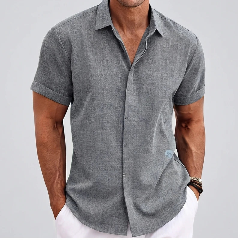 Model wearing Grey linen shirt in a studio