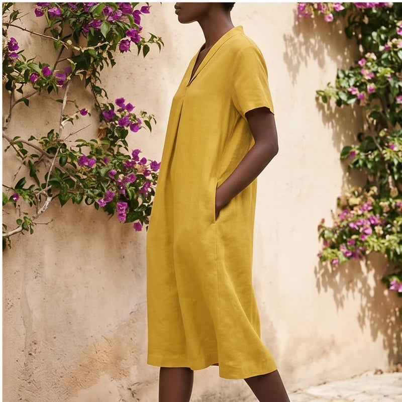 Model wearing Yellow Women's Short-sleeved Cotton and Linen Dress V-neck Loose Large Size Casual Vacation Street Long Dress with Pockets outdoors - 3