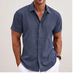Model wearing Blue linen shirt in a studio