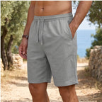 Model wearing Gray New Solid Linen Short Lightweight Gym Man Casual Pants Oversize Beach Hawaiian Baggy Pants Men Jogging Cotton Large Short Homme outdoors - 2