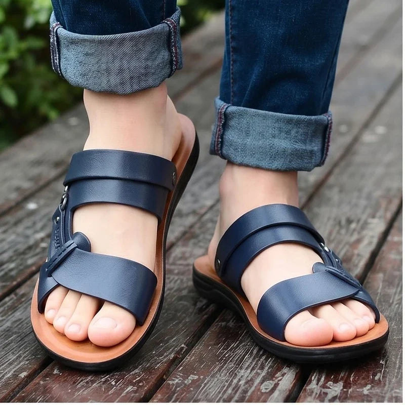 Model wearing Navy Meridian Genuine Leather Slip-On Fisherman Sandals outdoors