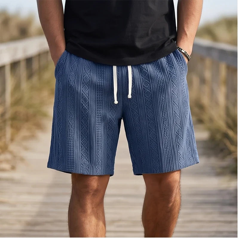 Model wearing Navy 2026 New Men's Daily Jacquard Textured Fashion Casual Shorts outdoors