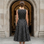 Model wearing Black Elegant Black A-Line Dress with Classic White Polka Dot Print Vintage Sleeveless Midi Dress for Formal Casual Occasions Dresses outdoors - 4