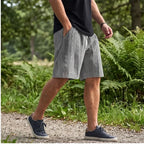 Model wearing Gray 2026 New Men's Daily Jacquard Textured Fashion Casual Shorts outdoors - 2