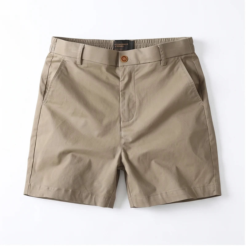 Khaki cotton shorts on a white background