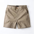 Khaki cotton shorts on a white background