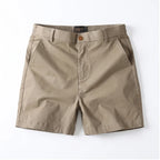 Khaki cotton shorts on a white background