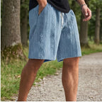 Model wearing Blue 2026 New Men's Daily Jacquard Textured Fashion Casual Shorts outdoors - 2
