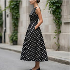 Model wearing Black Elegant Black A-Line Dress with Classic White Polka Dot Print Vintage Sleeveless Midi Dress for Formal Casual Occasions Dresses outdoors - 3