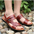 Model wearing Brown Meridian Genuine Leather Slip-On Fisherman Sandals outdoors - 3