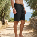 Model wearing Black New Solid Linen Short Lightweight Gym Man Casual Pants Oversize Beach Hawaiian Baggy Pants Men Jogging Cotton Large Short Homme outdoors - 2