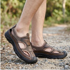 Model wearing Brown Cassian Genuine Leather Sport Sandals outdoors - 2