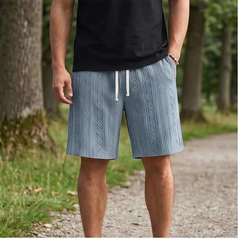 Model wearing Blue 2026 New Men's Daily Jacquard Textured Fashion Casual Shorts outdoors