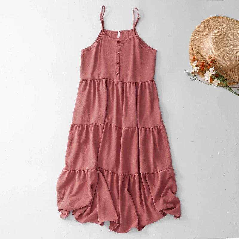 Pink cotton tiered A-line midi sundress.