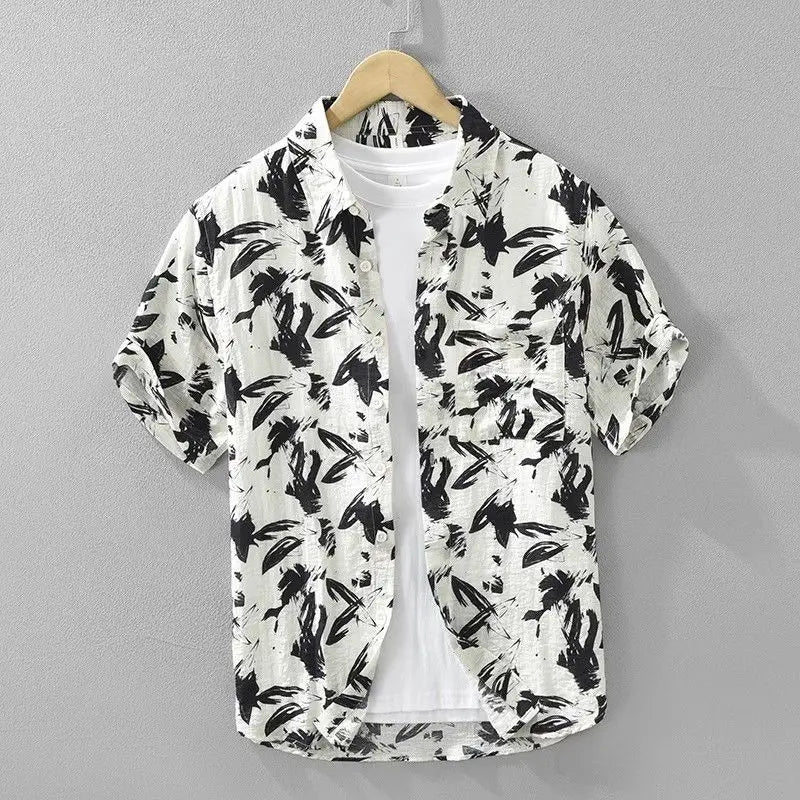 Short-sleeve shirt with black abstract pattern on a gray background