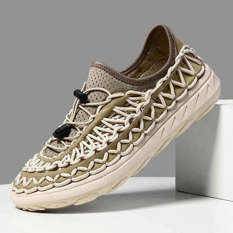 Olive green woven waterproof sneakers with tan sole and rope lacing.