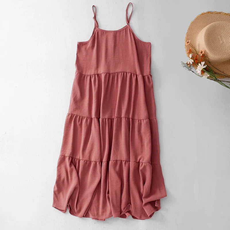 Pink cotton tiered A-line midi sundress.