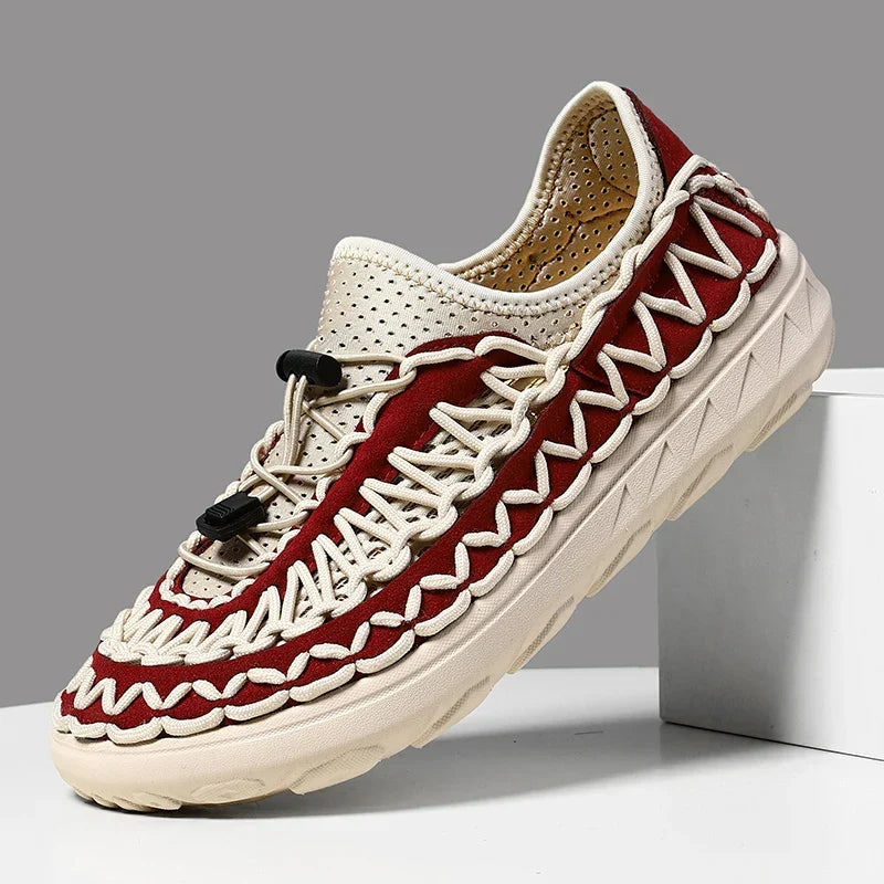 Red and cream woven waterproof sneakers with a toggle lace.