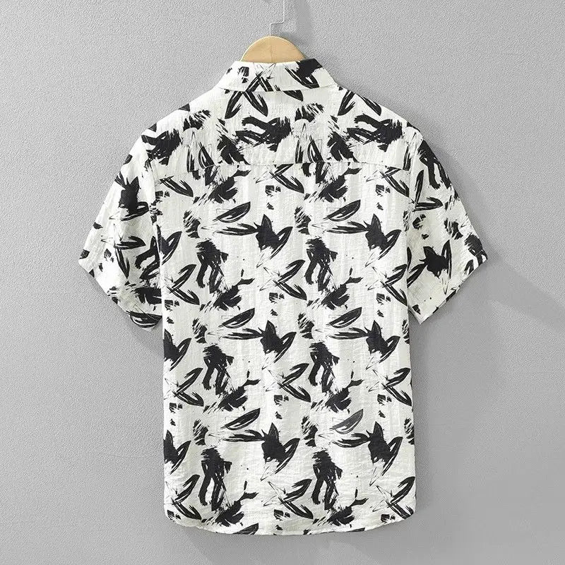 White shirt with black abstract pattern on a gray background