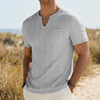 Model wearing Gray Soren Cotton V-Neck Pocket Tee outdoors