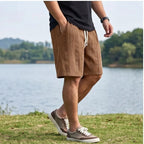 Model wearing Brown 2026 New Men's Daily Jacquard Textured Fashion Casual Shorts outdoors - 3