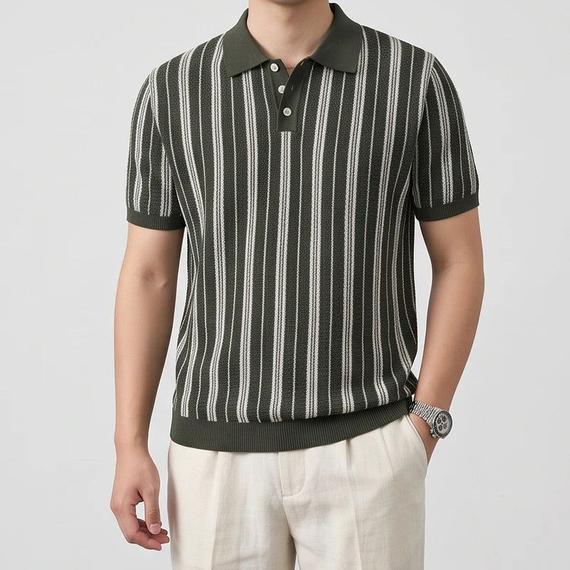 Green knitted polo on an off-gray studio background