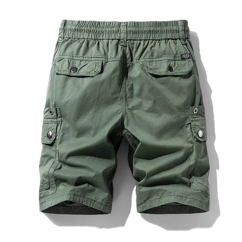 Flat lay, back view of olive green cargo shorts with an elastic waist, two rear pockets, and two side cargo pockets.