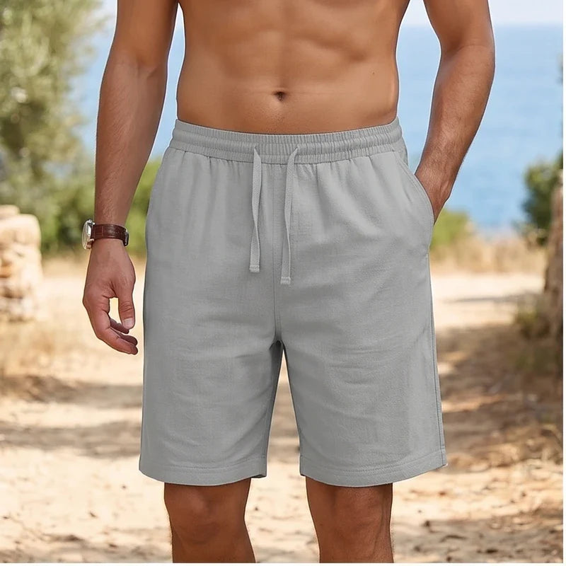 Model wearing Gray New Solid Linen Short Lightweight Gym Man Casual Pants Oversize Beach Hawaiian Baggy Pants Men Jogging Cotton Large Short Homme outdoors