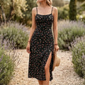 Model wearing Black Solenna Floral Spaghetti Strap Midi Dress outdoors