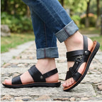 Model wearing Black Meridian Genuine Leather Slip-On Fisherman Sandals outdoors - 2