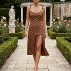 Model wearing Brown Cortez Polka Dot Midi Dress outdoors