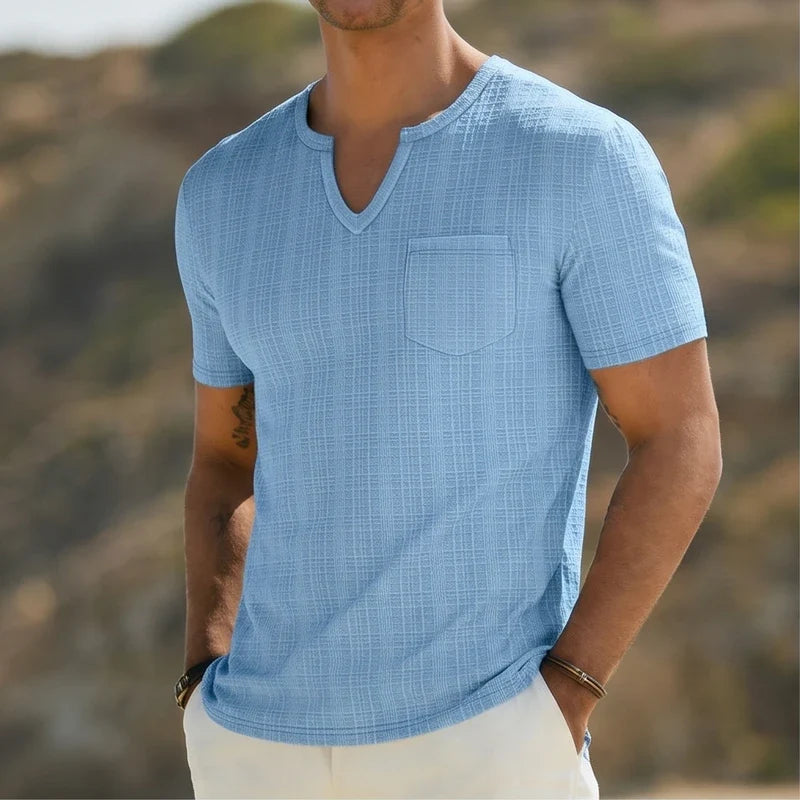Model wearing Blue Soren Cotton V-Neck Pocket Tee outdoors