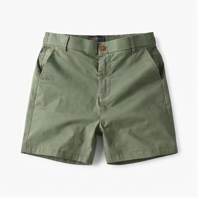 Green cotton shorts on a white background