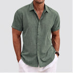 Model wearing Green linen shirt in a studio