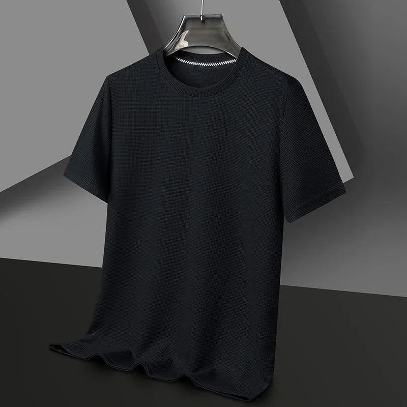 Black short-sleeve t-shirt with a textured knit pattern, white stitched crewneck, displayed on a dark hanger.