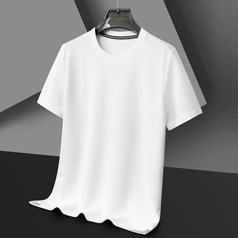 White short-sleeved knit crewneck shirt with a subtle textured pattern, hanging on a dark hanger against a grey background.