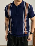 Man wearing a navy blue knit polo shirt with vertical brown and white stripes and a silver-toned zipper placket.