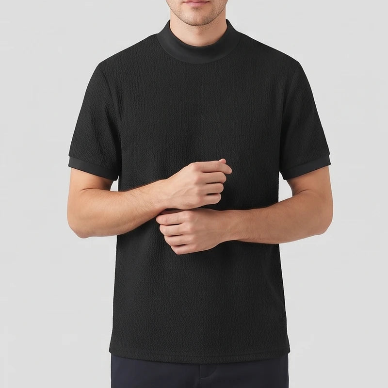 Black knit shirt on an off-gray studio background - 2