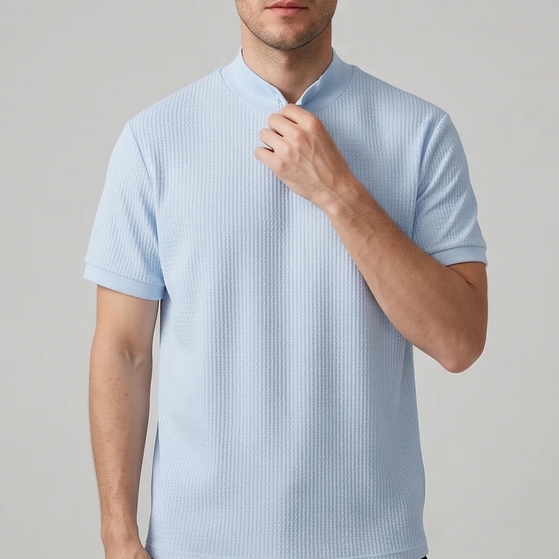 Blue knit shirt on an off-gray studio background - 2