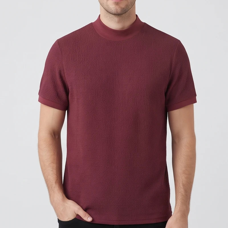 Burgundy knit shirt on an off-gray studio background - 2