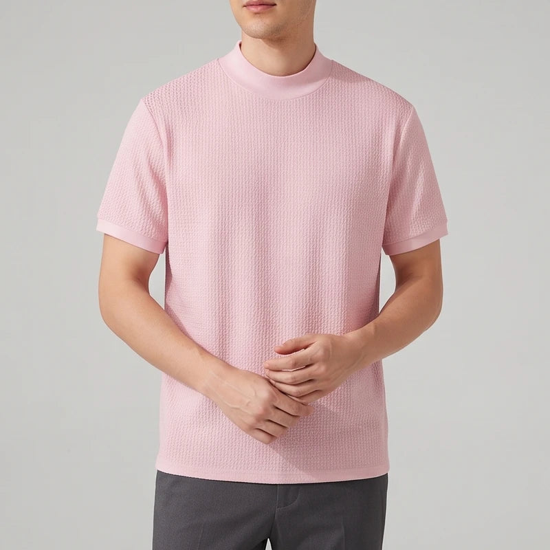 Pink knit shirt on an off-gray studio background - 2