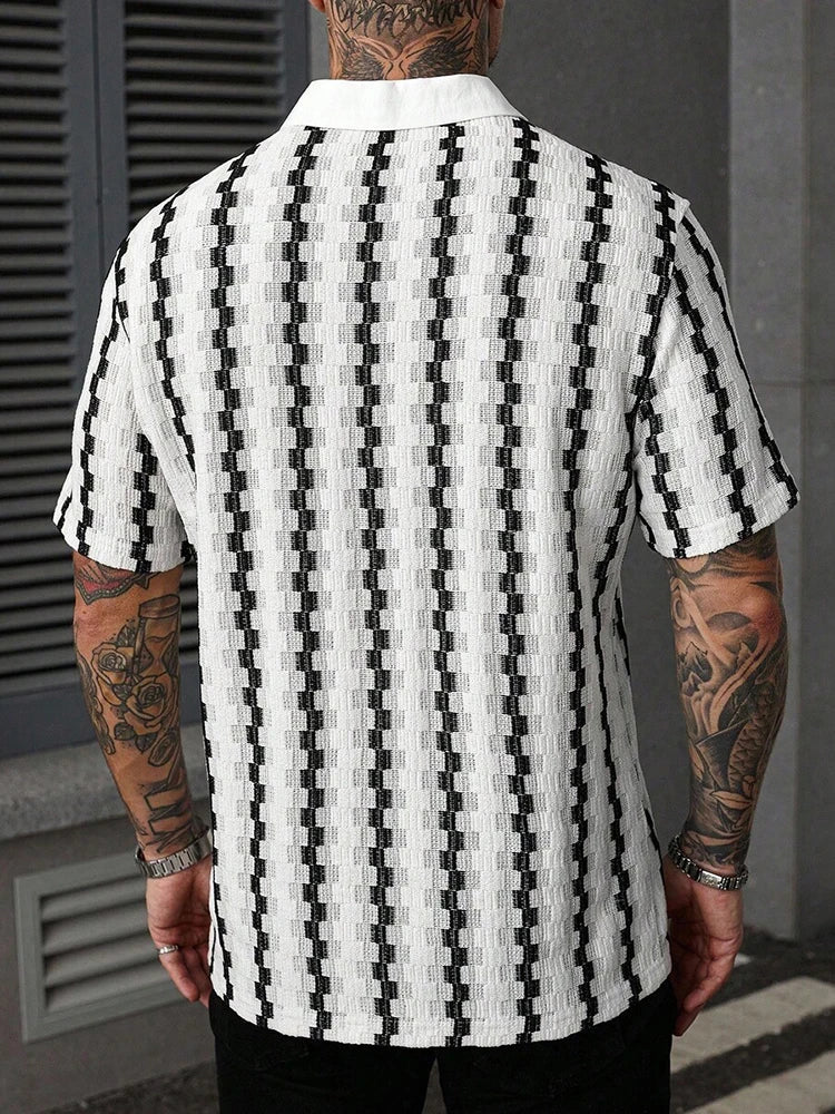 Man wearing a white and black textured knit short-sleeve shirt with a white collar, shown from the back.
