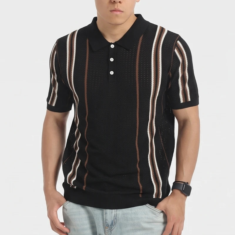 Black knitted polo on an off-gray studio background